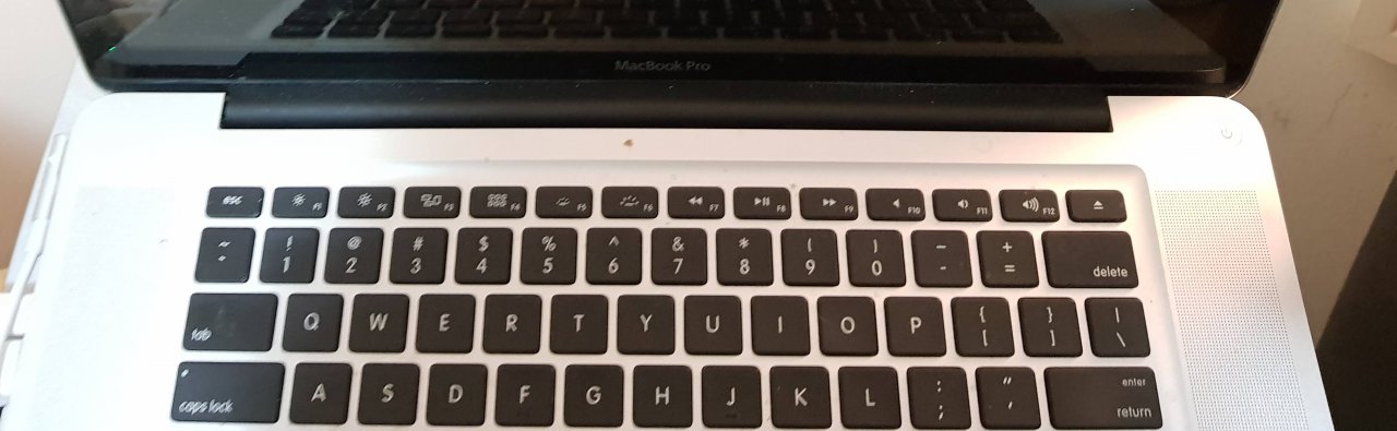 Macbook pro book black screen startup